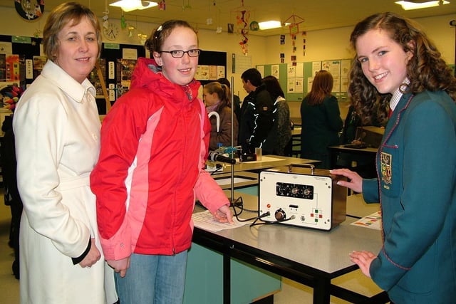 Left to right in the Chemistry lab at the Hunterhouse Open Evening in 2007 are Mrs Lyn Drummond, Harmony Hill Primary School pupil Katie McComb and Hunterhouse student Abigail Graham