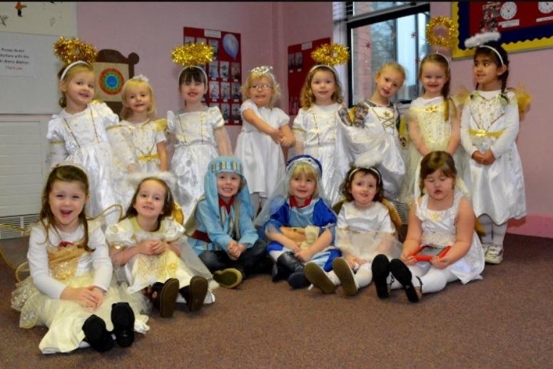 Mary and Joseph surrounded by angels at the Woodburn Playgroup Nativity play in 2014.