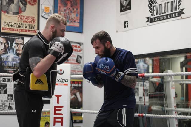 Cacace sparring with his trainer Iain Mahood ahead of next month's bout.