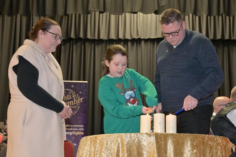 Christopher Smith and his daughter Meabh with NI Hospice social work team’s Aislinn Delaney.