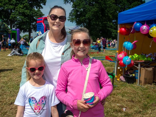 Enjoying a great day out at the Drumcree Parish Garden Fete are members of the Woolsey family including from left, Jessica (8), Rhiannon and Hannah (11). PT23-222.