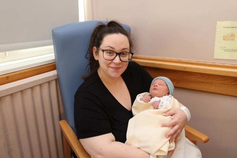 Marisa McBride with her baby Isaac McBride, who was born 40 secondss after midnight at the Royal Victoria Hospital weighing 7lbs.