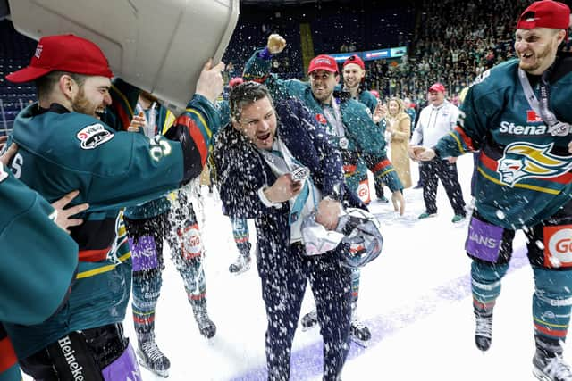 Belfast Giants team celebrate the 'treble' after being crowned Elite Ice Hockey League Champions, Challenge Cup Champions and the EIHL Playoffs Champions at the Motorpoint Arena, Nottingham.     Photo by William Cherry/Presseye