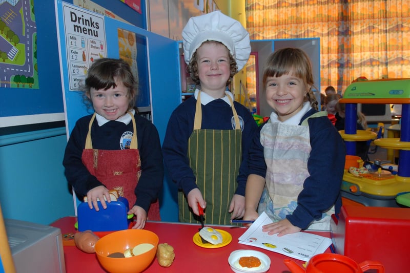 Sophie, Callum and Margaret-Diana making breakfast in the Olderfleet Primary School P1 classroom in 2011. INLT 40-303-PR