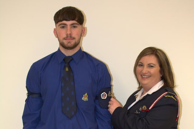 Matthew Keers receiving his Queens badge award from his mother Alison who is also the G.B. Captain.