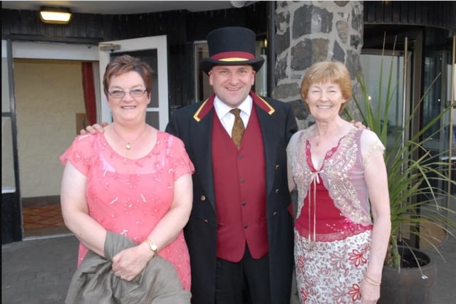 Colin McKee welcomes Norma Shannon and Ann Murray to Ballygally Castle Hotel for the Mayor's Ball in 2007.