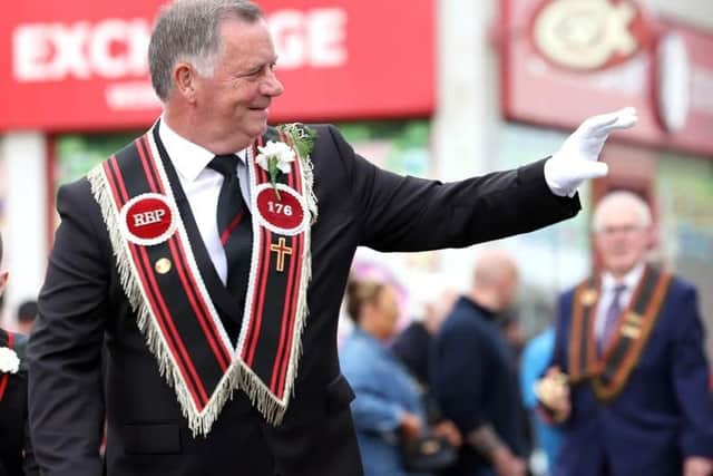 Spotting a friend during the parade in Bangor on Saturday. Picture: Stephen Davison / Pacemaker