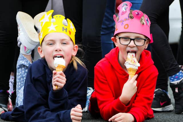 P5 pupils Molly and Leo enjoying their ice-cream at the Coronation Big Lunch.
