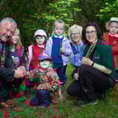 Former Mayor Cllr Ivor Wallace; Hilary Hutchinson, Principal Kylemore Nursery; Yvonne Thompson, Scheme Co-ordinator Rathain Fold, Caoimhe Suitor, Northern Ireland Forest Schools Association (NIFSA) with pupils from Kylemore Nursery.