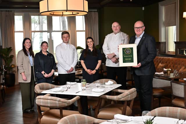 Left to right; Sinead McNicholl (Director of Sales & Marketing), Jodie Mairs (Head House Keeper), Mark Winters (Executive Sous Chef), Stephen Holland (Executive Head Chef), Holly Scott (Receptionist), Stephen Meldrum (General Manager) celebrate the latest award for Dunluce Lodge.