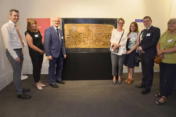Pictured at a preview of A British Museum Touring Exhibition Egyptian hieroglyphs: unlock the mystery at the Irish Linen Centre & Lisburn Museum with the Limestone lintel of Ramses III are: David Burns, Chief Executive of Lisburn & Castlereagh City Council; Wendy Hughes; Councillor Thomas Beckett, Communities & Wellbeing Chairman; Ilona Regulski, Curator of Egyptian Written Culture at the British Museum; Pauline Mawhinney; Professor Mike Mawhinney, High Sheriff of County Down and Angela McCann, Head of Communities. Pic credit: Lisburn and Castlereagh City Council