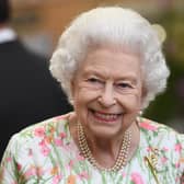 ST AUSTELL, ENGLAND - JUNE 11: Queen Elizabeth II attends an event in celebration of The Big Lunch initiative at The Eden Project during the G7 Summit on June 11, 2021 in St Austell, Cornwall, England. UK Prime Minister, Boris Johnson, hosts leaders from the USA, Japan, Germany, France, Italy and Canada at the G7 Summit. This year the UK has invited India, South Africa, and South Korea to attend the Leaders' Summit as guest countries as well as the EU. (Photo by Oli Scarff - WPA Pool / Getty Images)