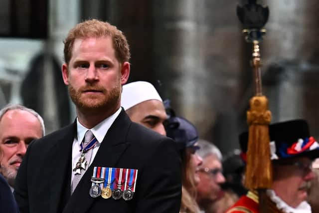 Prince Harry watched his dad being crowned king and then bolted (Picture: Ben Stansall/pool/AFP via Getty Images)