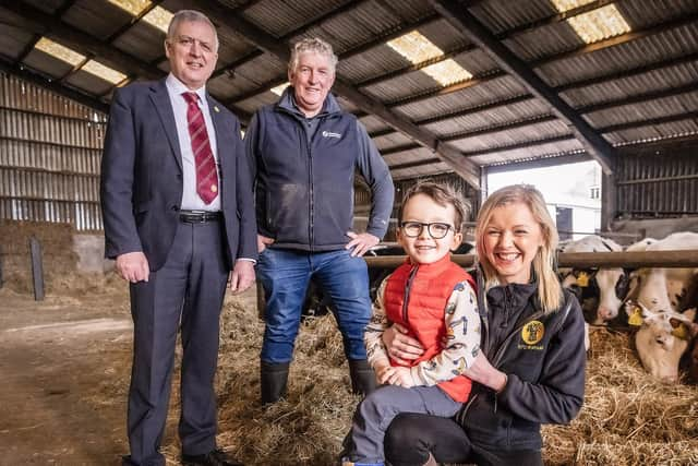 ​William Irvine, deputy president of UFU, Brian Matthews from Donagh Cottage Farm, Lauren Hamilton, NFU Mutual and 4-year-old Gabriel Murray.