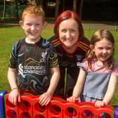 Cathy Daly and children, Lorcan (9) and Cara (7) enjoying the great weather at the  ABC Council/Healthy Kidz funday. PT35-243.