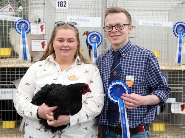 Judith Cairns with husband Mark and their overall bantam hen large winner.