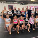 Sean Taaffe, Can You Dance? (CYD?)  is pictured with Paige Kerr (back row, third from left) and other dancers. Credit Fiona Brown Communications
