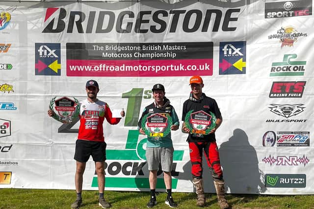 Martin Barr pictured with Brad Todd and Tom Grimshaw after winning the Pro MX1 Bridgestone British Masters at Hawkstone Park