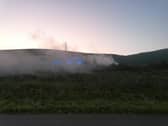 Firefighters at the scene of a fire in the Upper Springfield Road area of Belfast. (Pic: NI World).