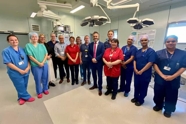 Minister Butler with Brian McFetridge (Director of Surgery, Elective Care, Paediatrics and Maternity) and LVH Day Procedure Unit Theatre Staff. Pic credit: SEHSCT
