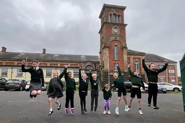 Pupils at Lurgan Model Primary School celebrating their successful parental ballot to transform to integrated status. Picture: Integrated Education Fund