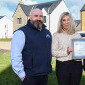 Pictured, from left, with one of the winners is: Mark Patterson, account executive, ICW; Sandra McCullough, new homes co-Ordinator, Lotus Homes; and Philip Quinn, director of surveying services, ICW