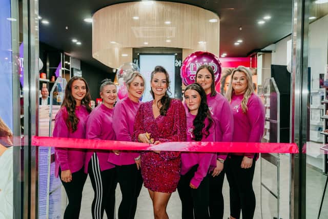 Makeup Artist and business owner Louise McDonnell, owner of LMD Cosmetics celebrates the opening of her first LMD Cosmetics Superstore in Fairhill, Ballymena. Joining Louise are members of her store team. The store will employ 12 staff. Credit: Supplied