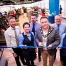 Cllr Mark Cooper cuts the ribbon to officially open Antrim Forum’s Fitness Suite, alongside members of the Leisure Team and Cllr Paul Dunlop. Pic: Antrim and Newtownabbey Borough Council).