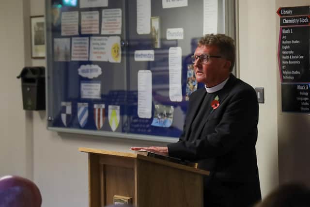 Rev Malcolm Patterson leads the memorial service at Cookstown High School.