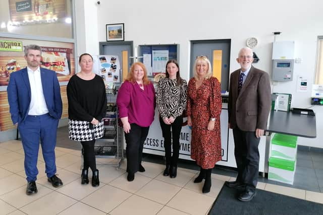 Alliance MLAs Naomi Long, Danny Donnelly and Stewart Dickson alongside Jackie Reid (Head of Business), Lorraine Black (Head of Services) and CEO Laura Steele.