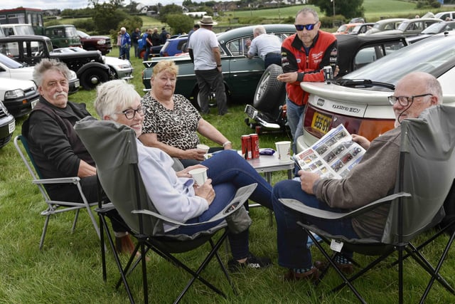 From left: William Copeland , Carol Hylands, Ann Copeland, David Trimble, Richard Hylands enjoy lunch beside a well cared for and beautiful Audi Quattro 20v.