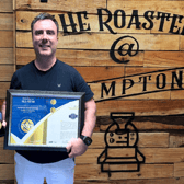 Rhyan McCoy, Owner and Founder at Hampton Roast Coffee, celebrates as Hampton Roast Coffee is honoured with the Business All-Star 2026 Accreditation from the All-Ireland Business Foundation.  Photo: Hampton Roast Coffee