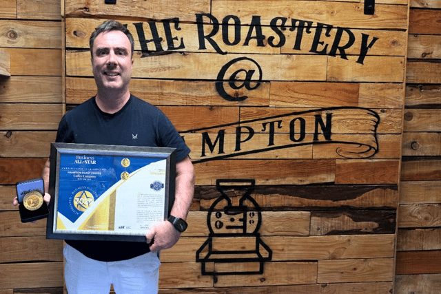 Rhyan McCoy, Owner and Founder at Hampton Roast Coffee, celebrates as Hampton Roast Coffee is honoured with the Business All-Star 2026 Accreditation from the All-Ireland Business Foundation. Photo: Hampton Roast Coffee