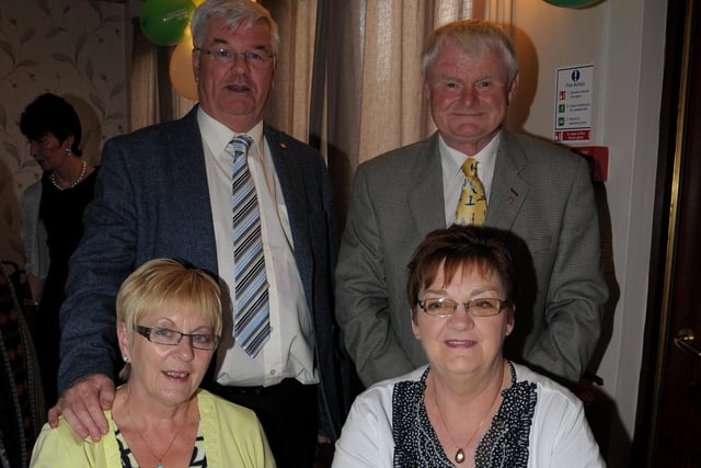 Dougie and Ann Bennett with John and Norma Shannon at the Macmillan ball in Larne Masonic Centre INLT 24-246-AM