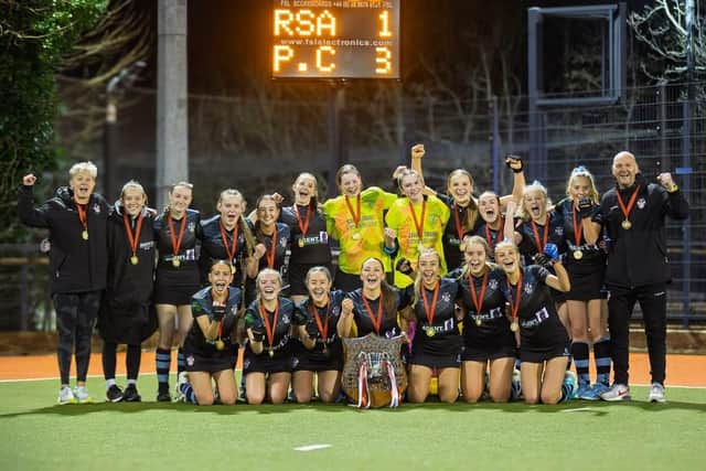 The Portadown College Girls 1st XI team celebrates victory in the Belfast Telegraph Senior Schools’ Cup final. Picture: Front Row Union