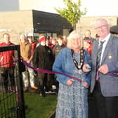 Denis McMacken and Deputy Mayor Margaret-Anne McKillop cut the ribbon at the official opening of Dungiven Bowling Club’s new synthetic bowling green. Credit: Causeway Coast and Glens Borough Council