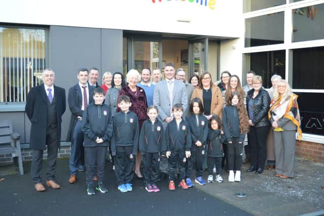 Lady Mary Peters, Fort Hill Integrated Primary School Principal Simon Patterson, Dr Melanie McKee, and attendees at the launch of the Active Schools programme. Pic credit: Stranmillis University College