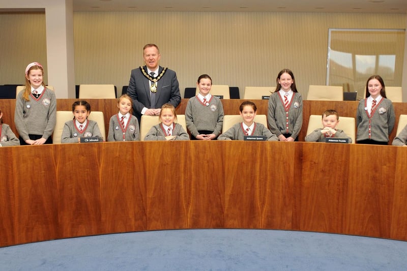 Lord Mayor of Armagh City, Banbridge and Craigavon, Councillor Paul Greenfield  welcomes the members of the St John the Baptist Primary School, Portadown, school council to the Council Chamber at Craigavon Civic Centre.