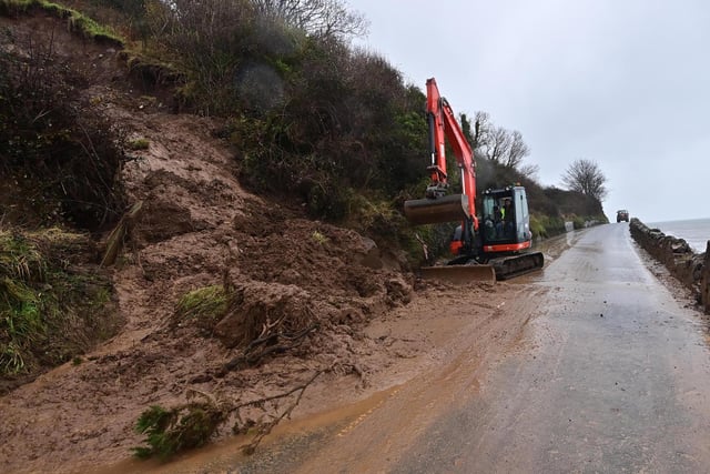 The clean-up operation on the Coast Road near Glenarm after a landslide.