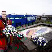 The Mayor of Antrim and Newtownabbey, Councillor Mark Cooper lays a wreath as a mark of respect. Picture: Antrim and Newtownabbey BC.
