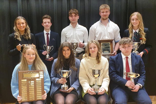 Year 14 Prize Winners. Back Row: Sophie Gordon -The Farmgate Meats Challenge Cup for Sporting Endeavour, Kameron McLean -The CAM Computer Services Cup for A Level Digital Technology, Sam Stevenson - The Brian Hanna Cup for Rugby Football, Lewis Chambers - The Stevenson Shield for Rugby, Jodie Savage - House Trophy
Front Row: Erin Kearney - The Lions Award for Community Service, Lottie Williamson - The Charlene Barr Cup for Hockey, Katie Thompson - The Williams Cup for Hockey, Stuart Smith, The Lavery Cup for A Level History.