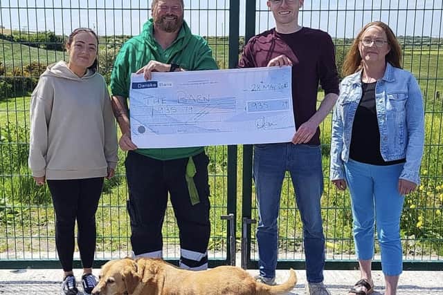 Pictured presenting the cheque to BARN are Ross Magee, Kelly Jordan and Michelle Maxwell, who were lucky enough to visit BARN and see the vital difference their donation will make Pic credit: Spar Lambeg