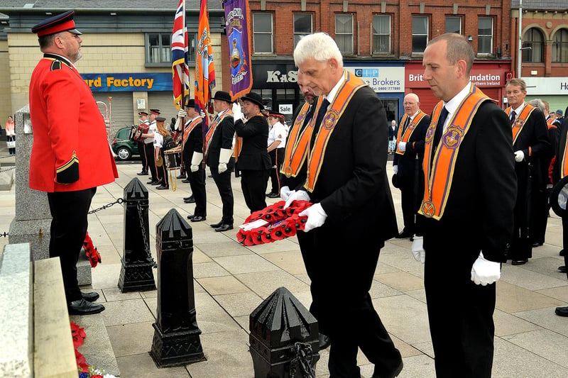 Portadown Worshipful District Master, Nigel Dawson lays a wreath at the War Memorial on Wednesday during the annual 12th parade. PT28-207.