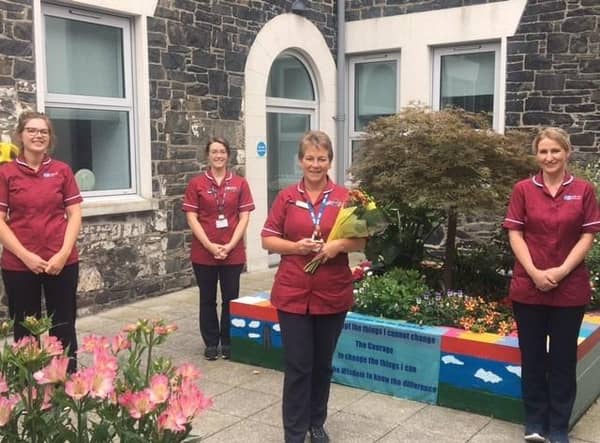 Tissue Viability Nurse, Claire Mackin, who is celebrating 40 years in nursing, is pictured alongside other members of the team