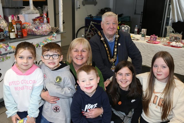 Pictured at the RNLI Coffee morning in Cushendall are these young visitors with the Mayor and Deputy Mayor.