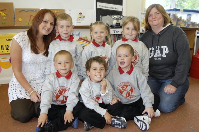 Primary One pupils at Bunscoil Eoin Baiste in 2007 pictured with teacher Miss Ellen Laverty, eft and classroom assistant Sarah McGeown.