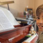 Nine-year-old Max rehearsing for his appearance at the Counterpoint Coleraine concert in June. CREDIT COUNTERPOINT