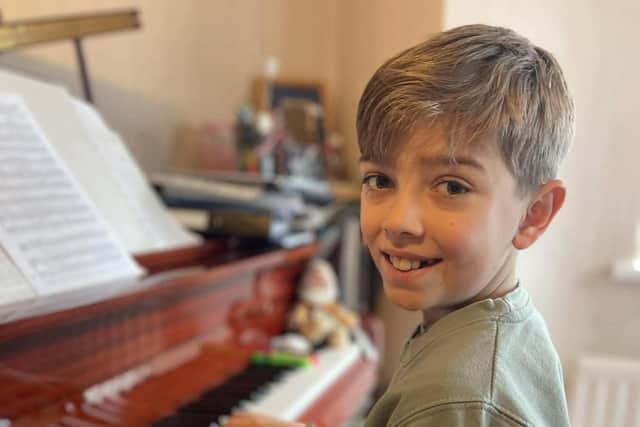 Nine-year-old Max rehearsing for his appearance at the Counterpoint Coleraine concert in June. CREDIT COUNTERPOINT