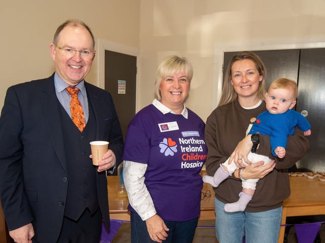 Smiling for the camera at the coffee morning are from left, Graeme Clarke, Diane Clarke, Rebecca Stewart and Bella Stewart (6 months).