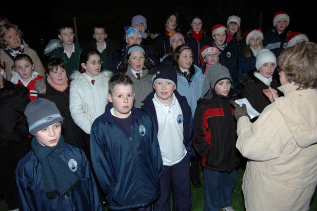 Olderfleet Primary School leading the carol singing at the Larne Harbour Christmas tree in 2006. LT49-370-PR